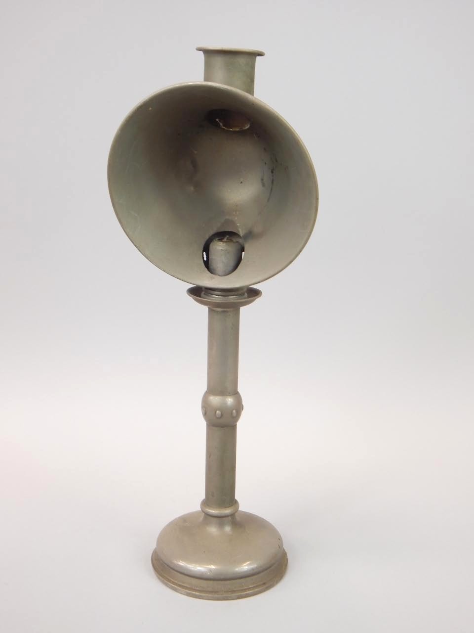 A Victorian pewter candlestick with shade, 42cm high.