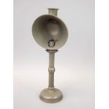 A Victorian pewter candlestick with shade, 42cm high.