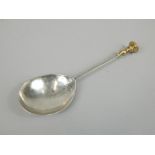 A mid 17thC silver seal top spoon, marks indistinct, initialled to the reverse of the bowl C.B.S.,