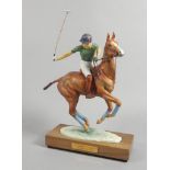 A limited edition Royal Worcester figure, of Prince Charles on Pan's Folly, modelled by Lorne