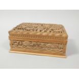 Tribal Art. A modern African carved hardwood box decorated with various animals, 29cm wide.