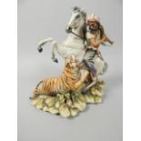 A Capo di Monte porcelain figure by Mariani, titled The Tiger Hunt, with certificate, 35cm high.