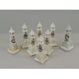 Eight crested porcelain clock towers, to include the clock tower of Skegness.