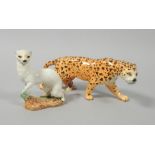 Two Beswick animals, a figure of a leopard, 30cm wide and a stoat no.1021.