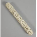 A late 19th/early 20thC Chinese ivory bodkin type case, carved overall with dragon etc., 17cm long.