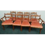 A set of eight 19thC mahogany dining chairs, each with an ebony strung back, padded seat on reeded