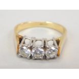 An 18ct gold three stone diamond ring, with three round brilliant stones approx 0.25cts each, 4.7g