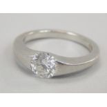 A platinum diamond solitaire ring, with central round brilliant diamond, approx 0.71cts, in