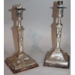 A pair of 19thC Old Sheffield plate candlesticks, each of neo-classical form, with urn dish