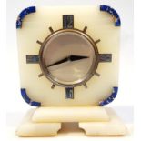 A 1930's Art Deco marble and chrome plated mantel clock, the 6cm dia. dial marked eight days Swiss