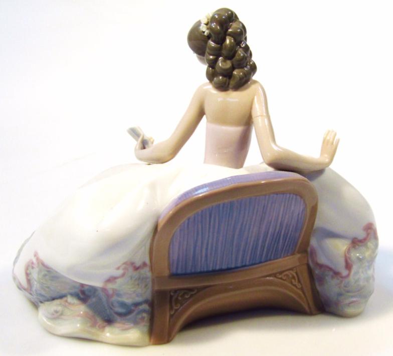 A Lladro porcelain figure, of a lady with a flowing dress holding a fan, impressed no. 5859 to the - Image 2 of 5