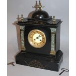 A Victorian black slate mantel clock, of architectural design with domed top and brass finial