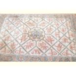 A fine handmade beige ground carpet, 305cm x 457.5cm. Auctioneers Note: This was purchased as a