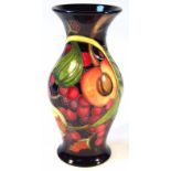 A modern Moorcroft Queens Choice vase, printed and impressed marks beneath, 22cm high. (boxed)