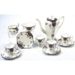 A Shelley Black Leafy Tree pattern part coffee service, comprising coffee pot, 20cm high, cream jug,