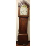 A 19thC oak and mahogany 30 hour longcase clock, the pierced finial raised above an arched case