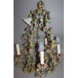 A highly decorative 20thC five branch chandelier, of entwined floral metal outline decorated in