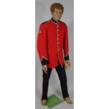 An Army Regiment tropical mess kit, comprising red tunic with navy epaulets and other badges and