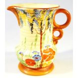 A mid-20thC Wade Heath jug, of ribbed bellied outline, hand painted with trees and flowers,