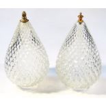 A near matching pair of Waterford style cut glass light shades, each of tapering bellied circular