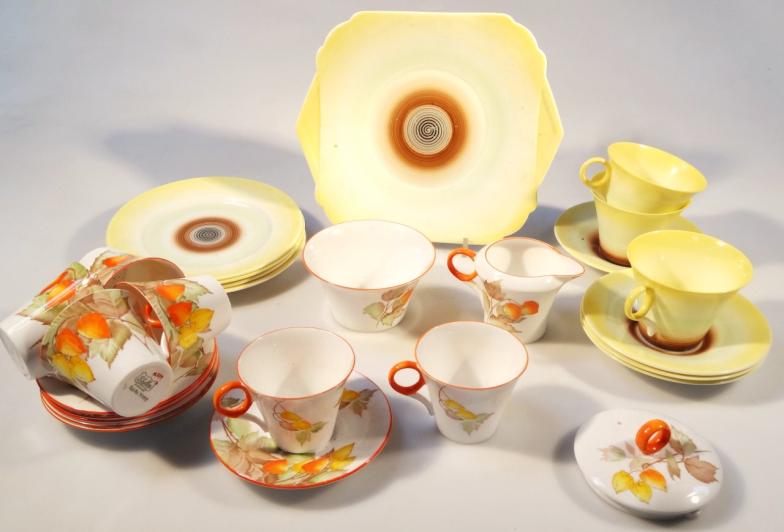 A 1930's Shelley part Art Deco tea service, comprising cups, sandwich plate, saucers, 14cm dia.