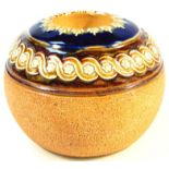 A late 19thC Doulton Lambeth match holder, by Ethel Beard, of compressed circular form with an upper