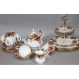 A Royal Albert Old Country Roses part tea service, to include two tier cake stand, 27cm high,