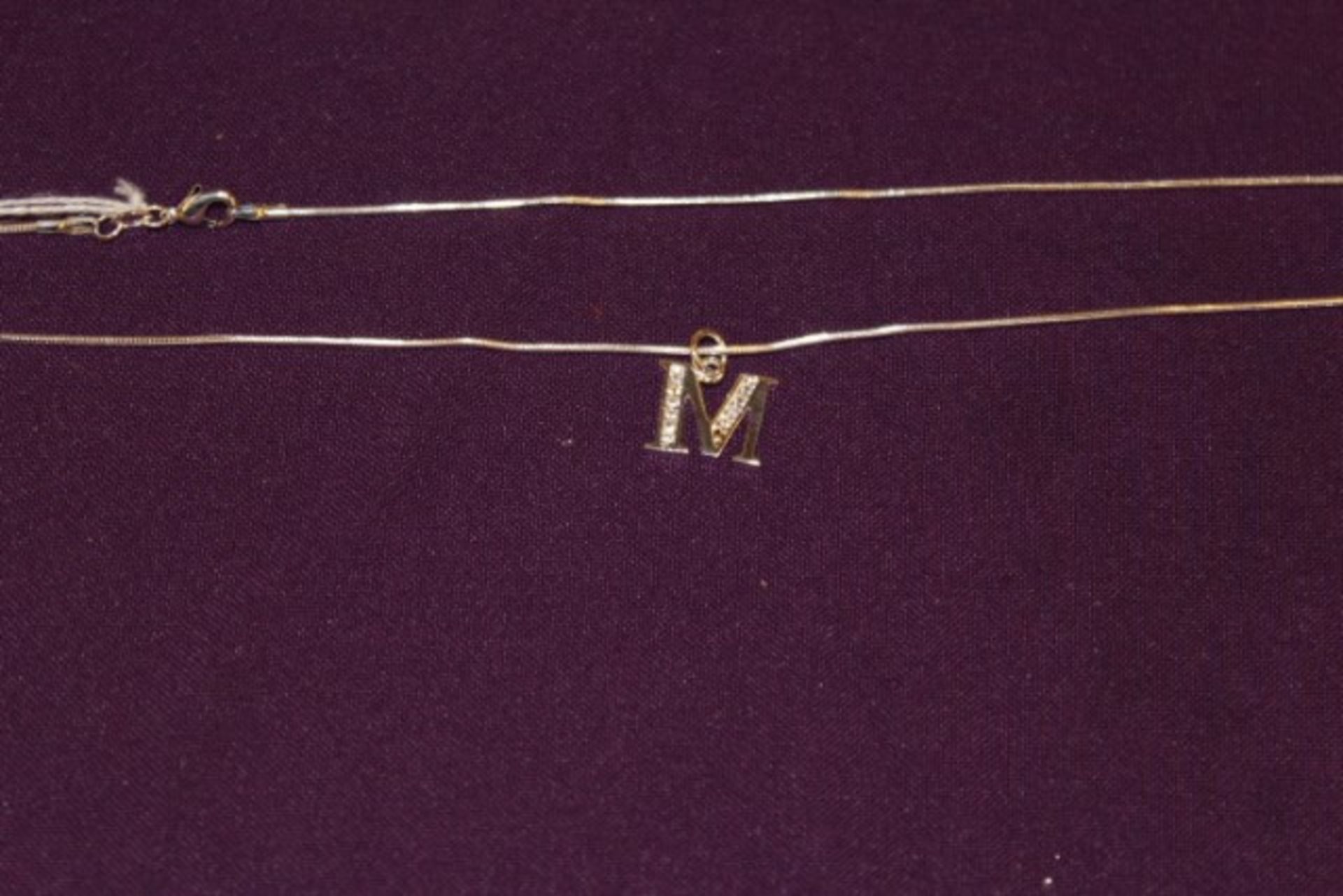 Grade U WM Necklace With "M" Pendant
