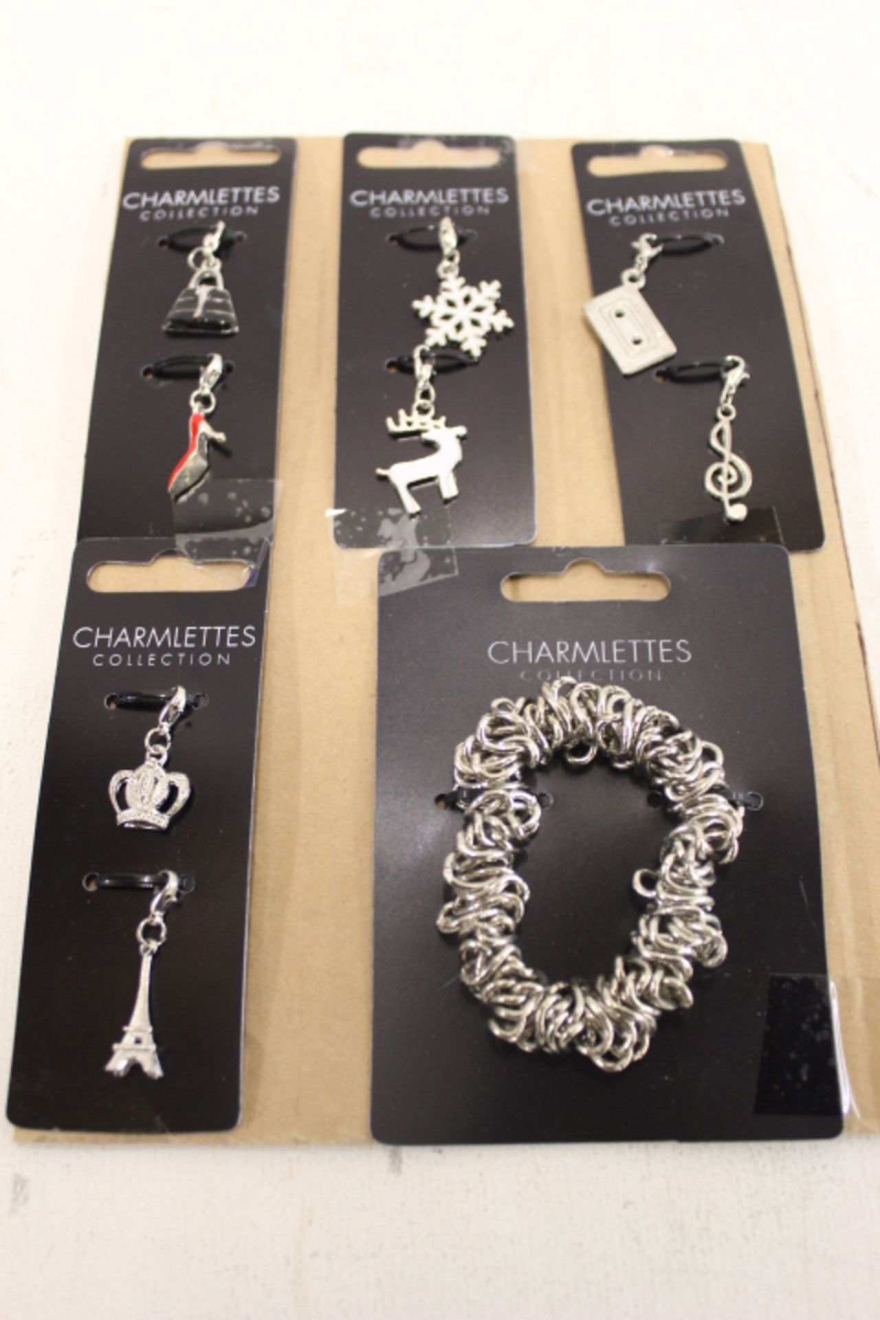 Grade U Nine Charmlettes Jewellery