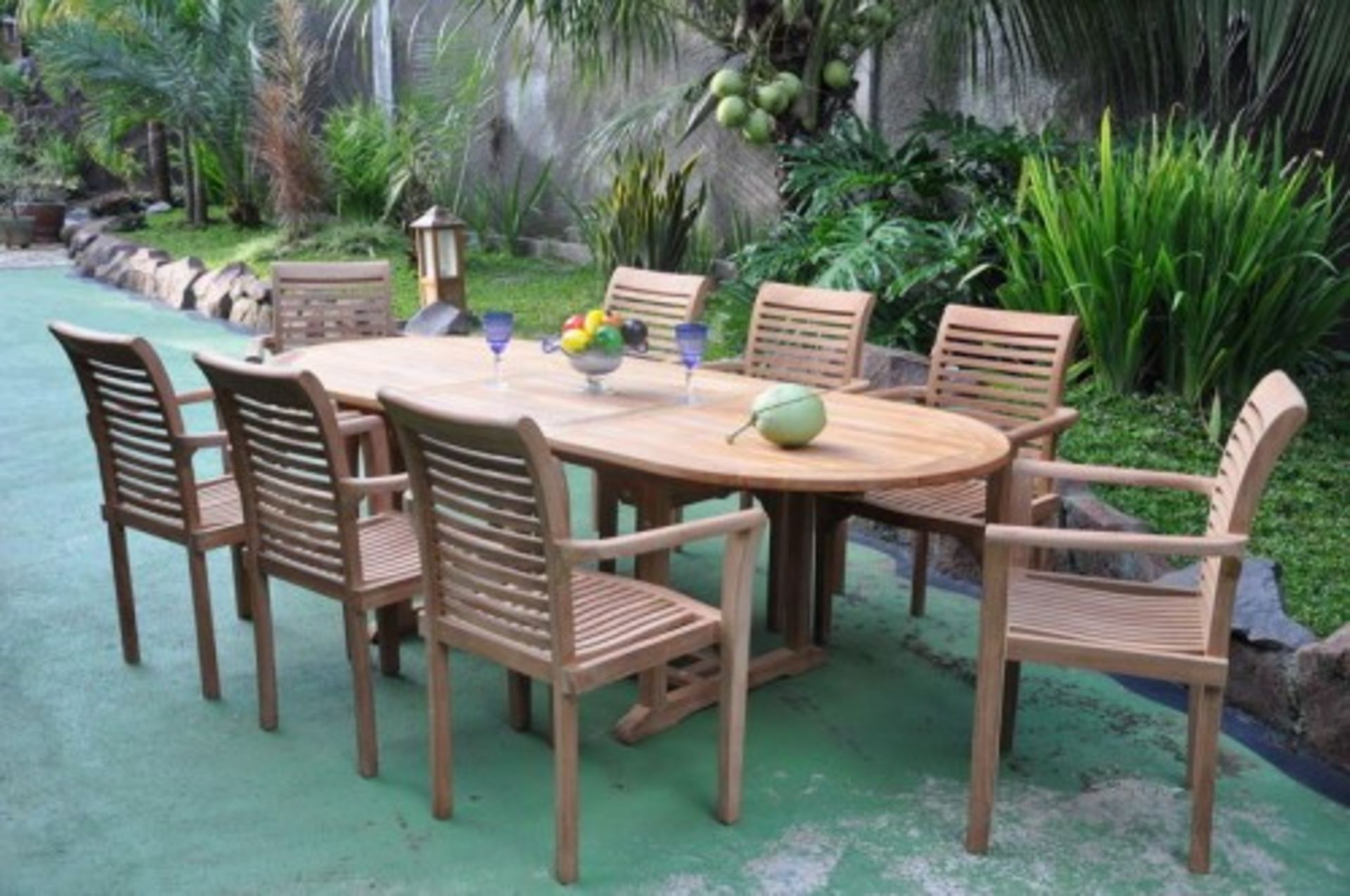 V Brand New Teak Extended Oval Table Set Allows For Up To 8 People including 8 stacking chairs and 8