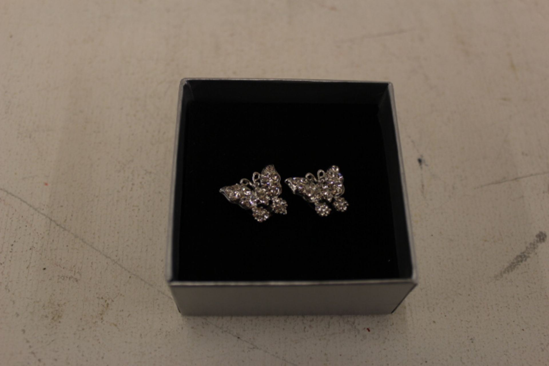 Grade U Pair White Stone Butterfly Earrings