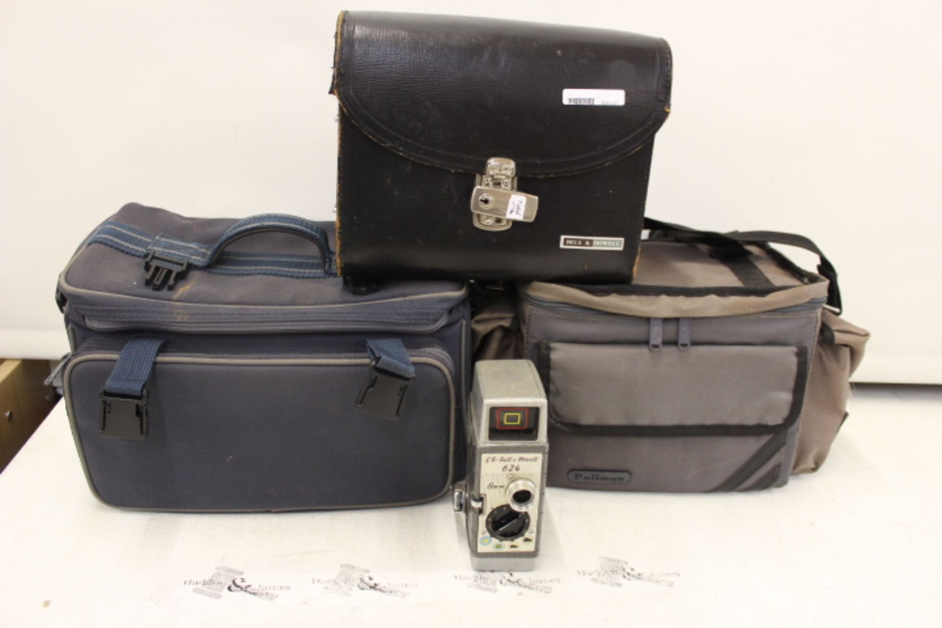 Bell & Howell Cine Camera & Two Large Camera Bags