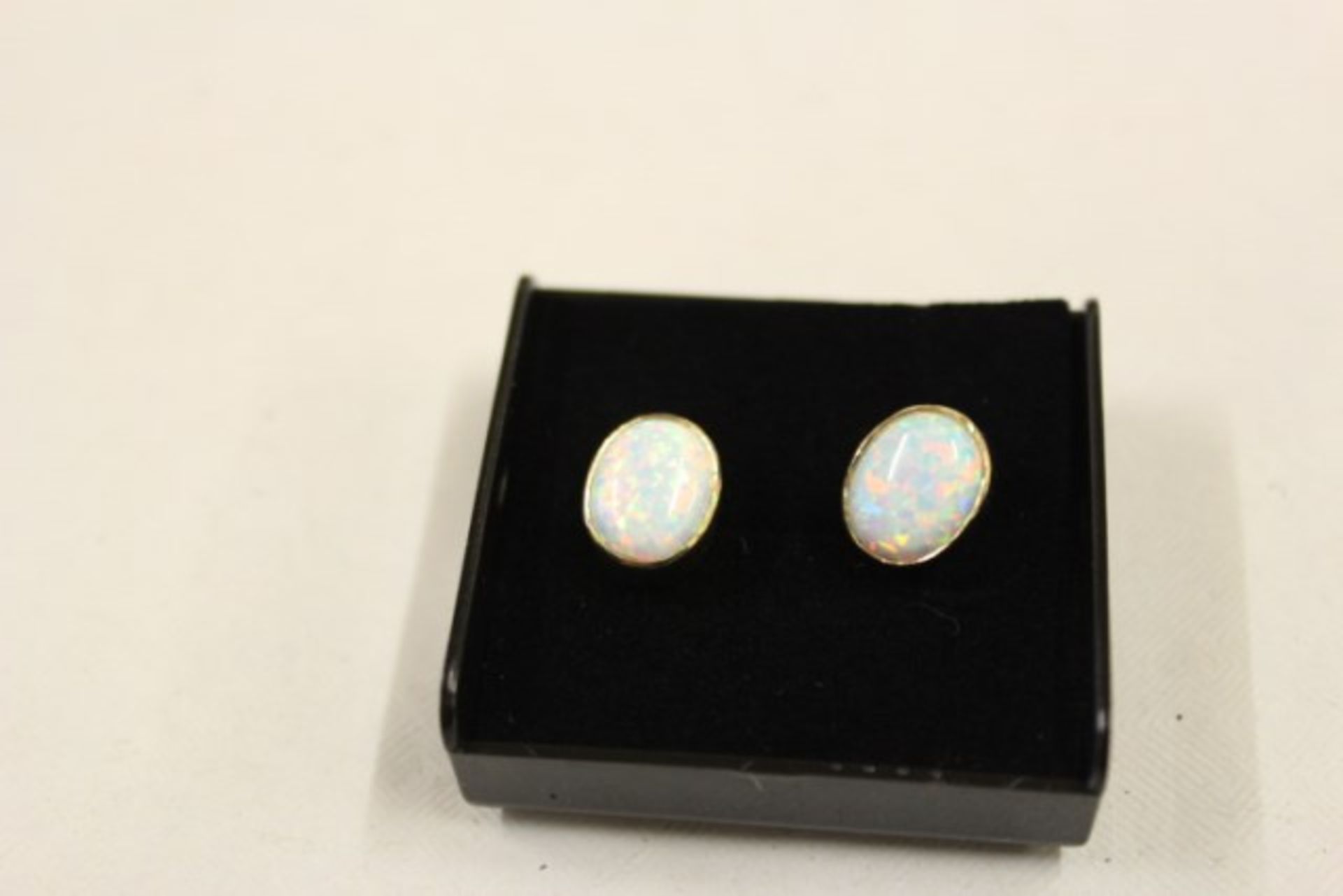 V Brand New Pair Gold Opal Earrings