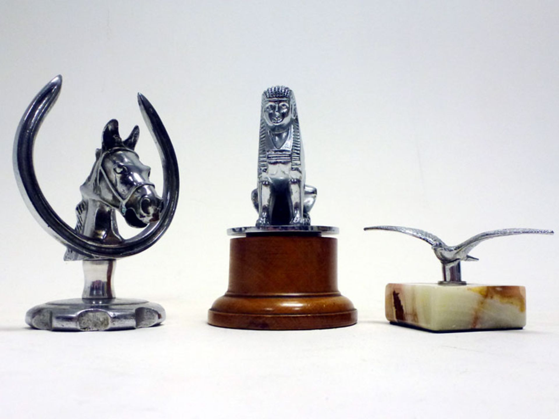 Three Car Mascots