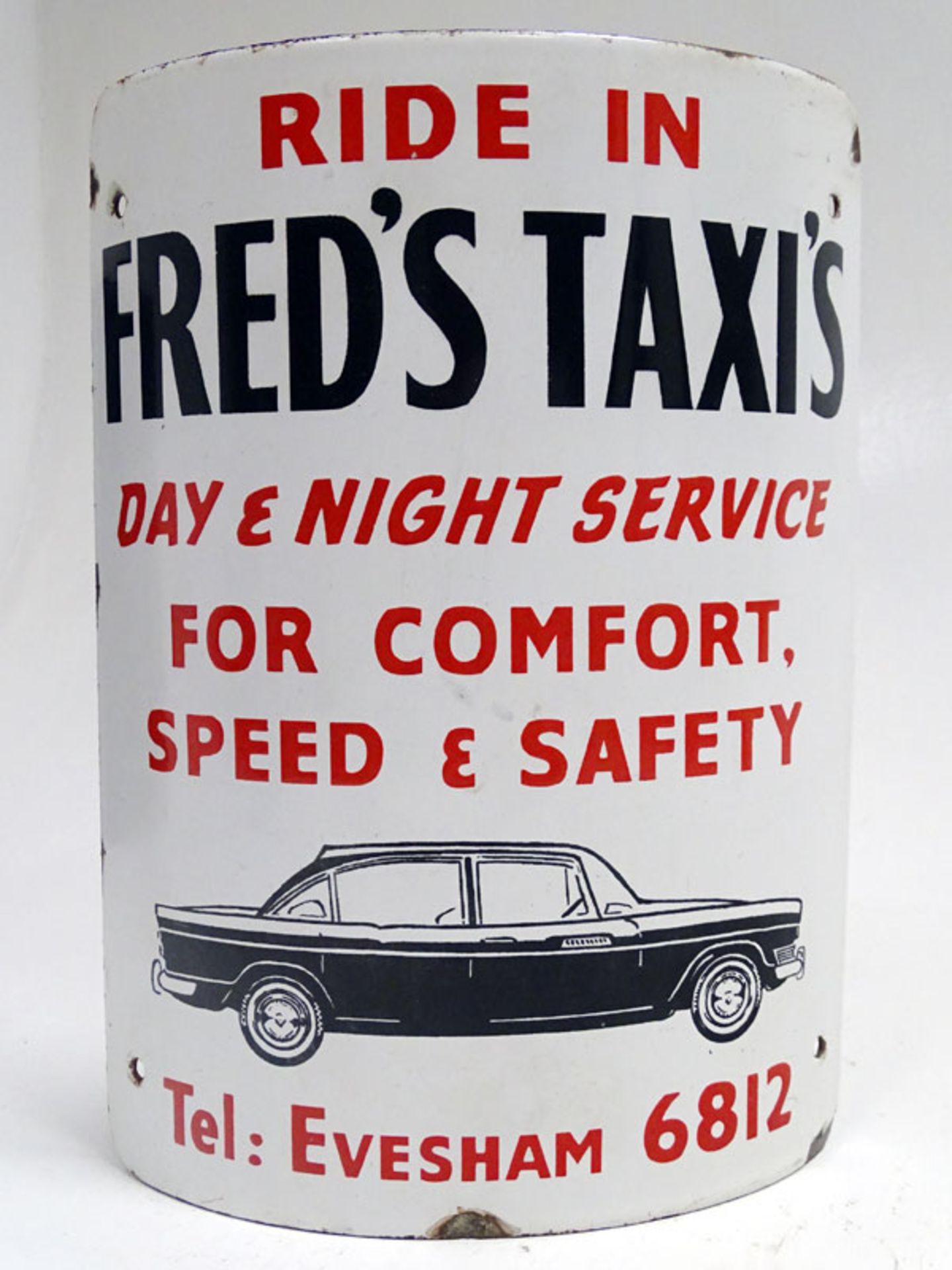 Fred's Taxi's Pictorial Enamel Sign