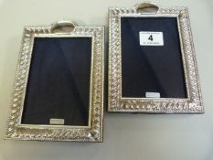 A pair of hallmarked silver photo frames