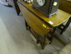 An Oak gateleg table