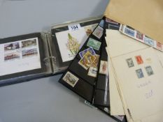 A Collection of stamps and an album of first day covers