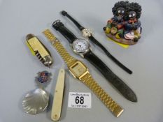 Ingersoll watch, casio watch and one other, Pen knives, Tea Caddy and a Golly Figure