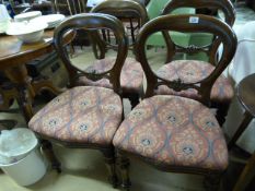 Set of four balloon back chairs