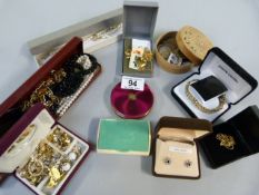 A quantity of costume jewellery, Art Deco compact etc.