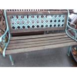 A Wooden bench with cast iron ends