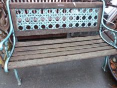 A Wooden bench with cast iron ends