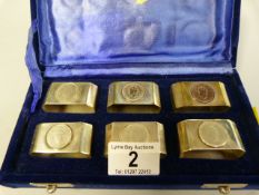 A cased set of commemorative napkin rings