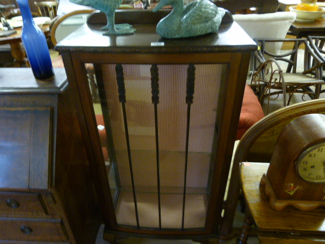 Small display cabinet on claw on ball feet