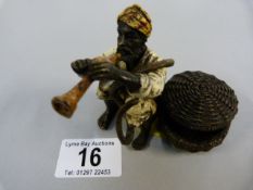 Modern "Bergman" style bronze of a snake charmer