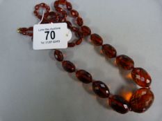 An amber necklace with faceted decoration