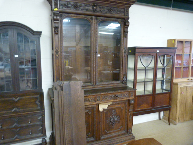 Heavily carved Flemish Oak bookcase with cupboard under - Image 7 of 10