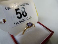 Cushion cut Tanzanite and Zircon ring