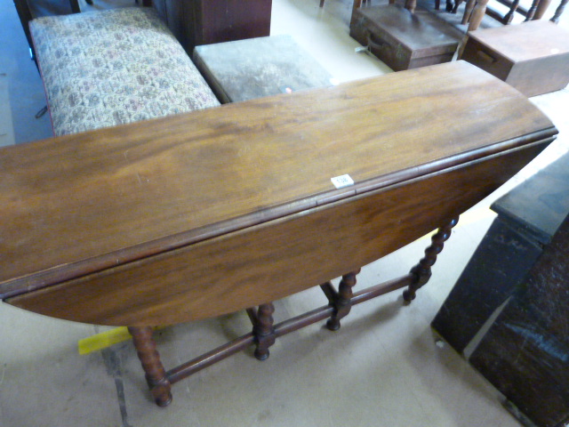 A mahogany drop leaf table with barley twist legs - Image 2 of 10